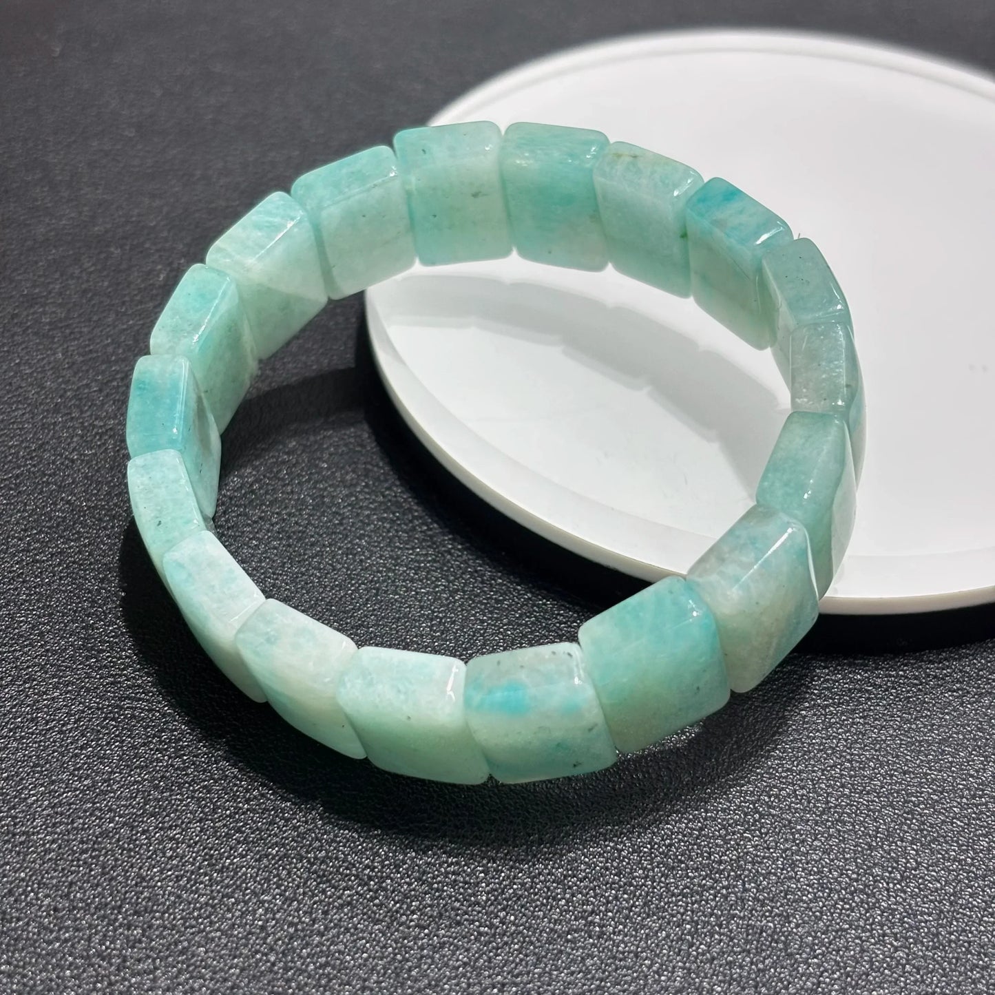Amazonite Square Bead Bangle displayed on a white plate, highlighting the 18mm x 15mm bead size and smooth texture.