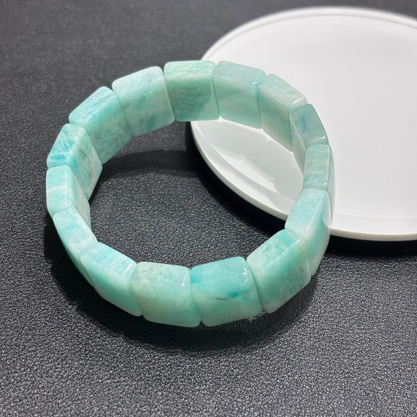 Pair of Natural Amazonite Bangle Bracelets laid flat, showing the 18cm stretch length and uniform bead sizing.