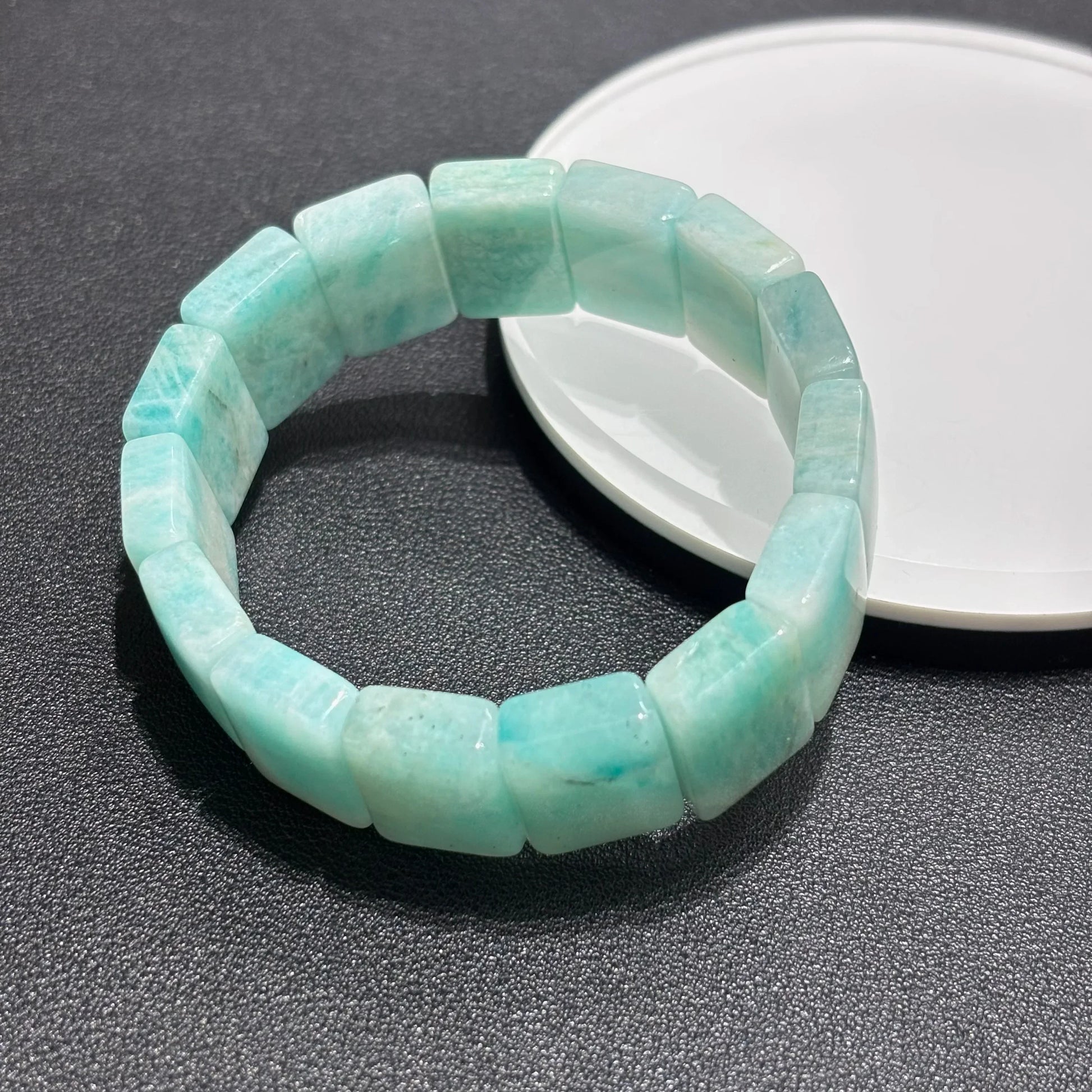 Pair of Natural Amazonite Bangle Bracelets laid flat, showing the 18cm stretch length and uniform bead sizing.