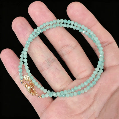 detail view of gold tone 5cm extender chain and lobster clasp on amazonite necklace