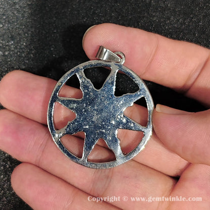 Back view of 45mm metal alloy star frame showing enclosed round amethyst stone with internal cloud patterns