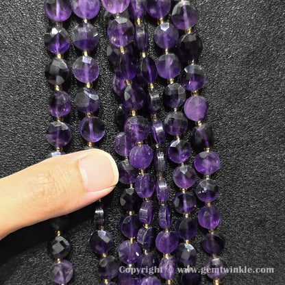 Finger pointing to amethyst faceted coin beads for 8mm and 10mm size preview