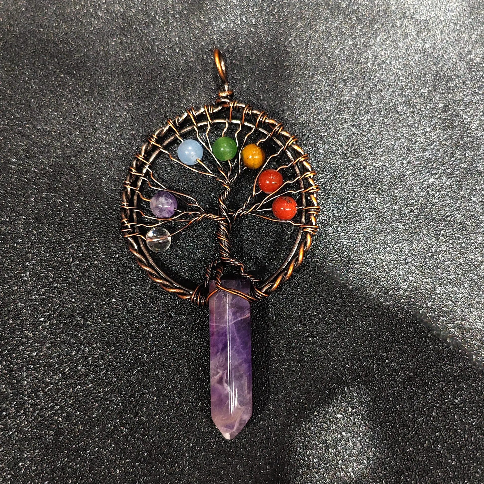 Antique copper-tone wire tree of life wrapped natural amethyst point pendant with multi color beads