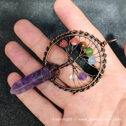 Angled hand preview of 8cm wire wrapped amethyst hexagon point pendant for jewelry making