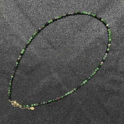 Artistic Ruby in Zoisite gemstone collar necklace featuring 3mm micro faceted beads and gold extension chain