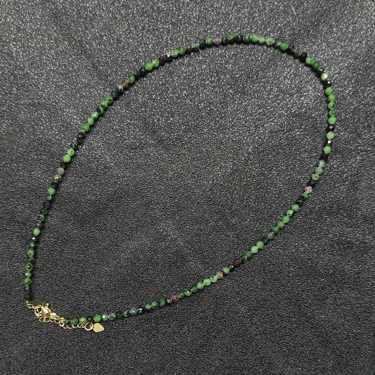 Artistic Ruby in Zoisite gemstone collar necklace featuring 3mm micro faceted beads and gold extension chain