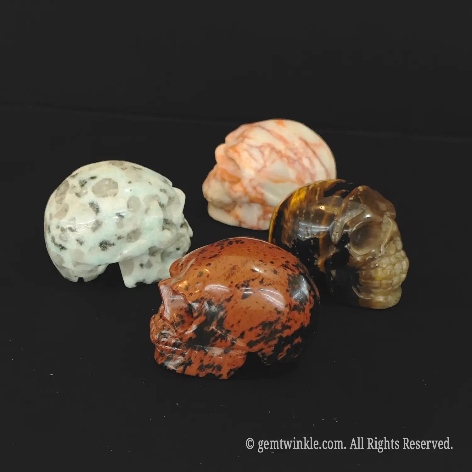 various natural stone skull carvings