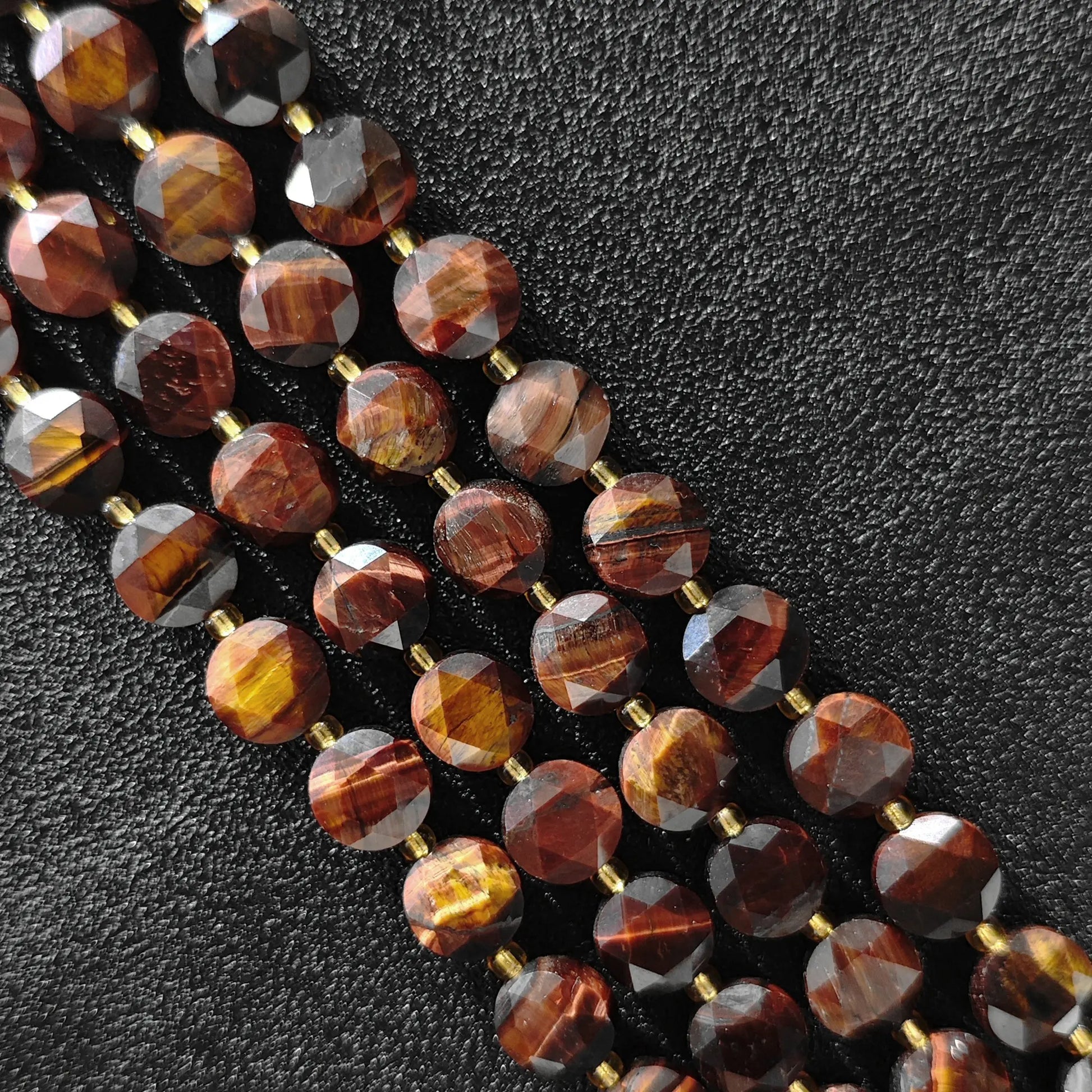 Strands of auburn red tiger eye hexagram disc beads with star faceted surface