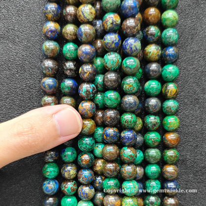 Perspective view of azurite malachite round beads highlighting polished finish across 4mm to 12mm sizes