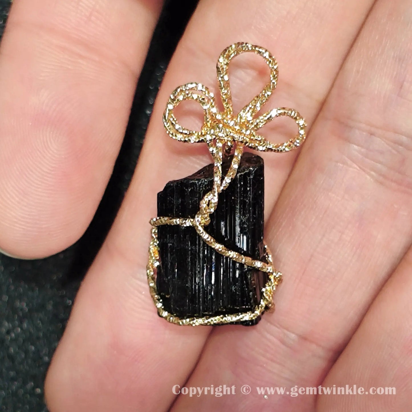 Back view preview showing natural mineral texture of 30mm raw black tourmaline wire wrapped charm