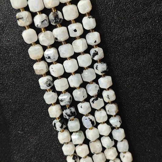 Full strands of natural black spot blue moonstone square block beads featuring artistic mineral inclusions for wholesale buyers