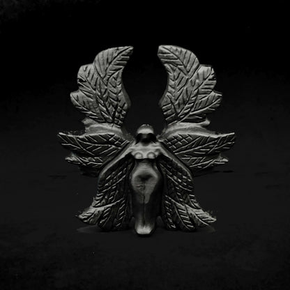 Front view of a 10cm hand carved black obsidian Seraphim statue showcasing symmetrical six layered wings