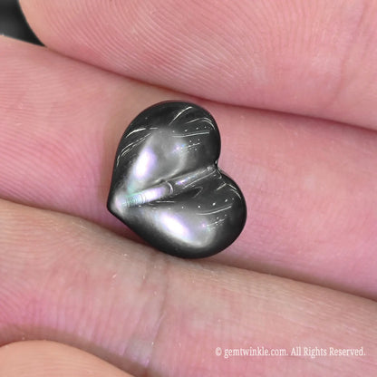 Black lip shell heart focal bead side profile showing smooth 3d puffy contours and natural shell thickness