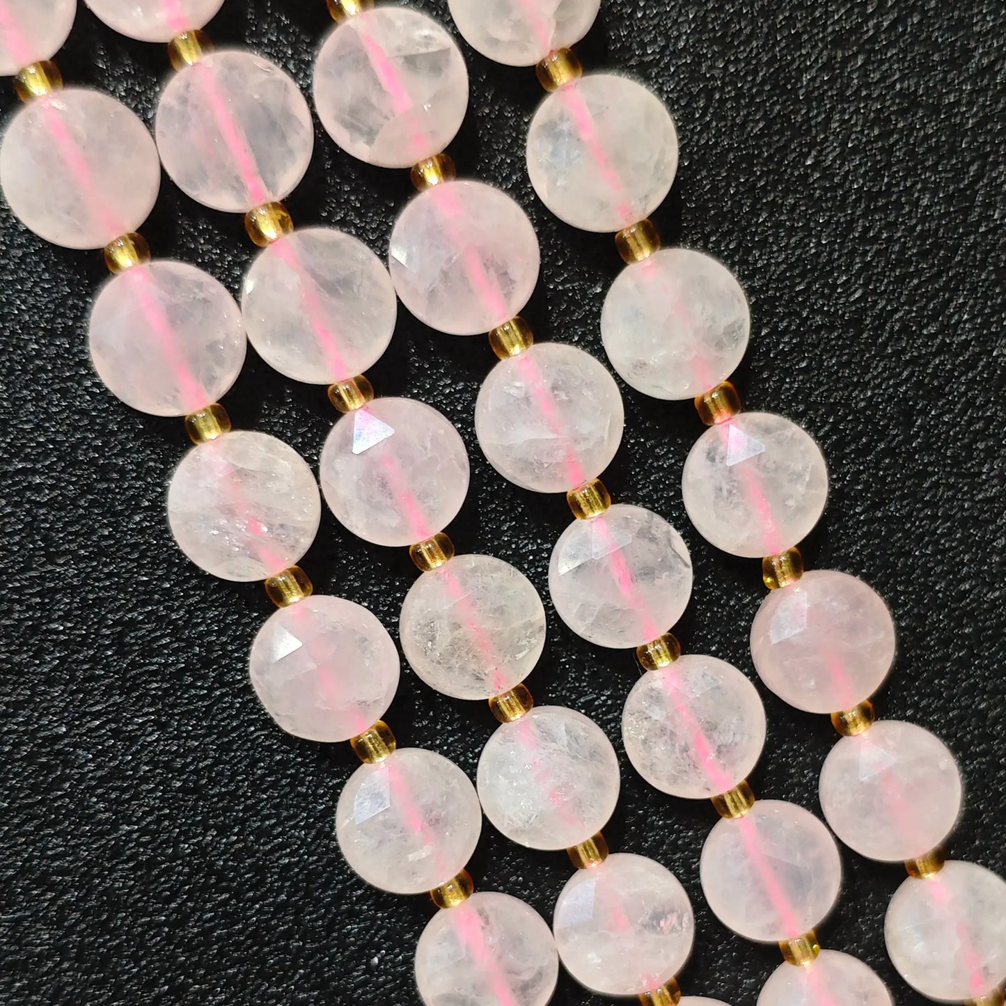 Strands of blush rose quartz hexagram disc beads with star faceted surface