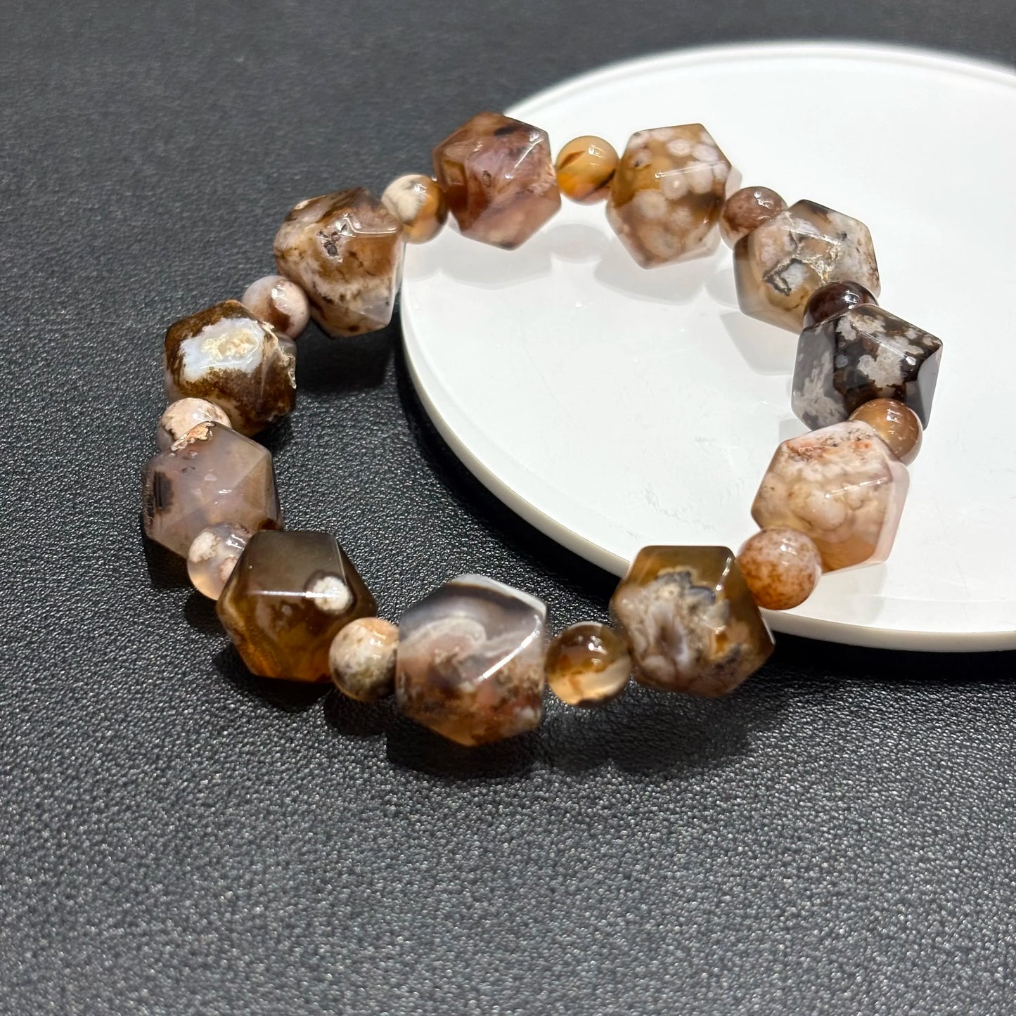 Brown Sakura Agate Bracelet on Black Background