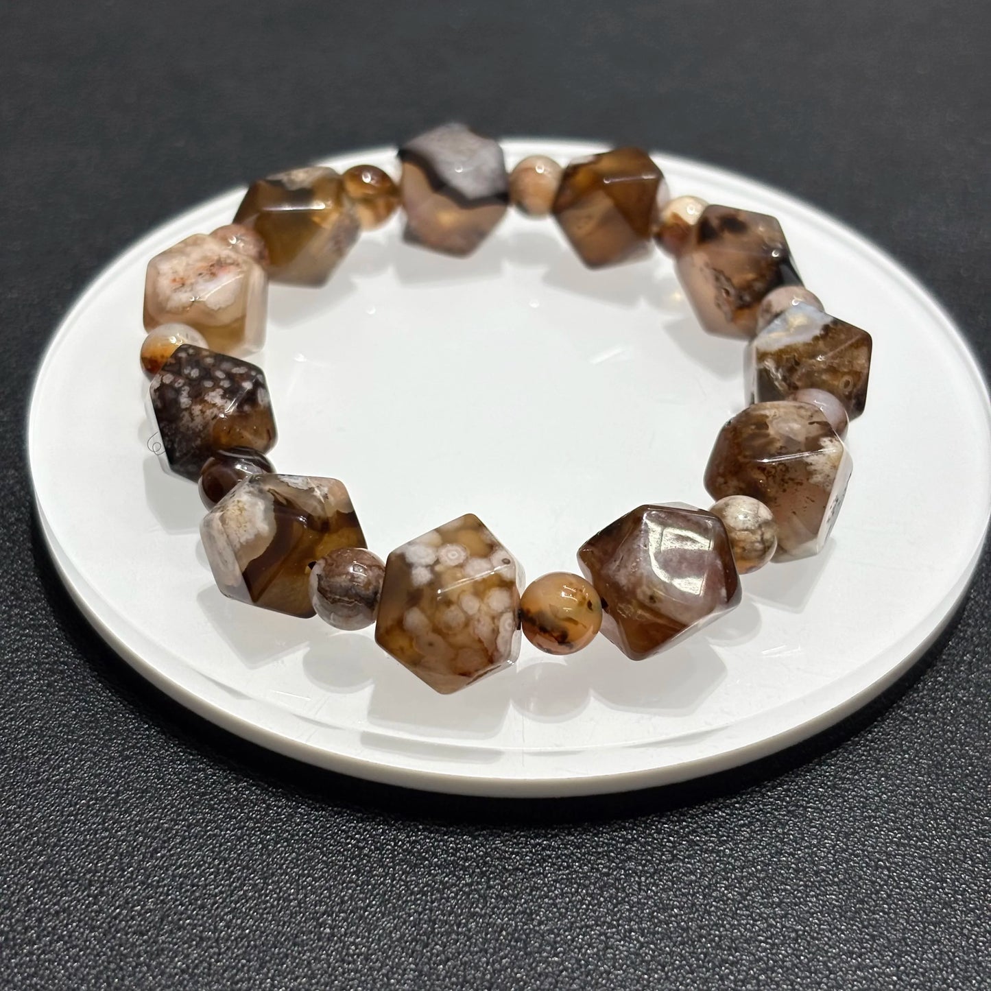 Brown Sakura Agate Bracelet on White Plate