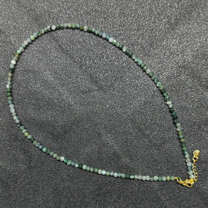 Translucent moss agate faceted necklace with 3mm beads and gold extension chain layout for wholesale supply