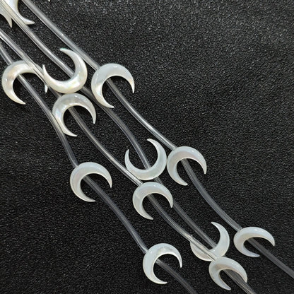 Carved crescent moon white mother of pearl beads full strand view