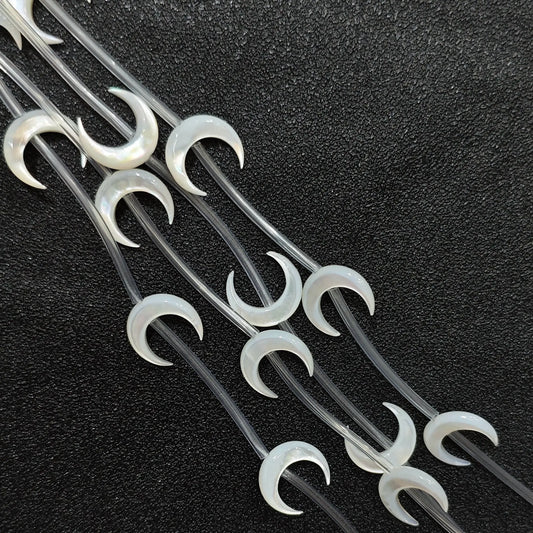 Carved crescent moon white mother of pearl beads full strand view