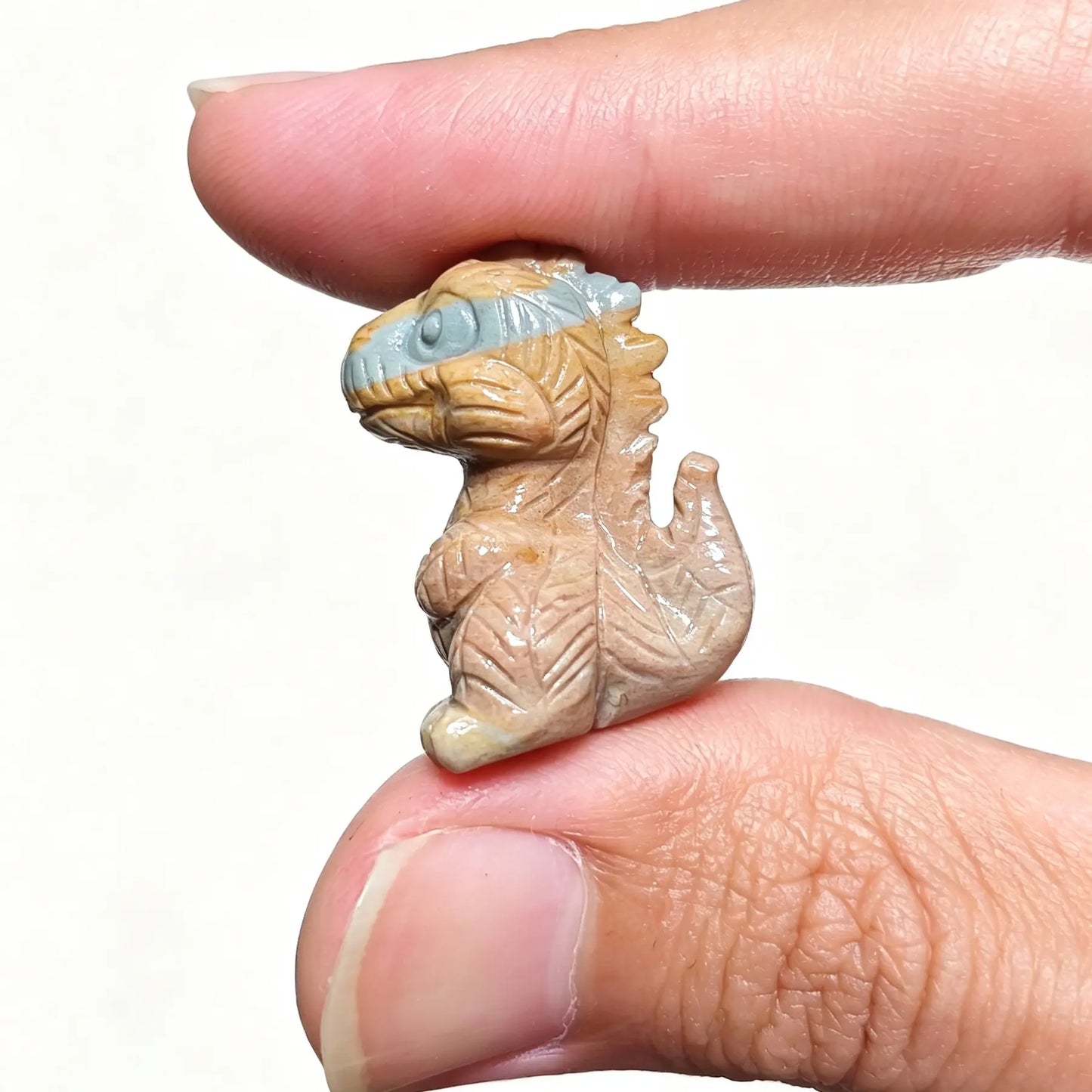 carved baby trex dinosaur stone statue 2.8cm stock