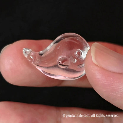 carved crystal whale figurine top view