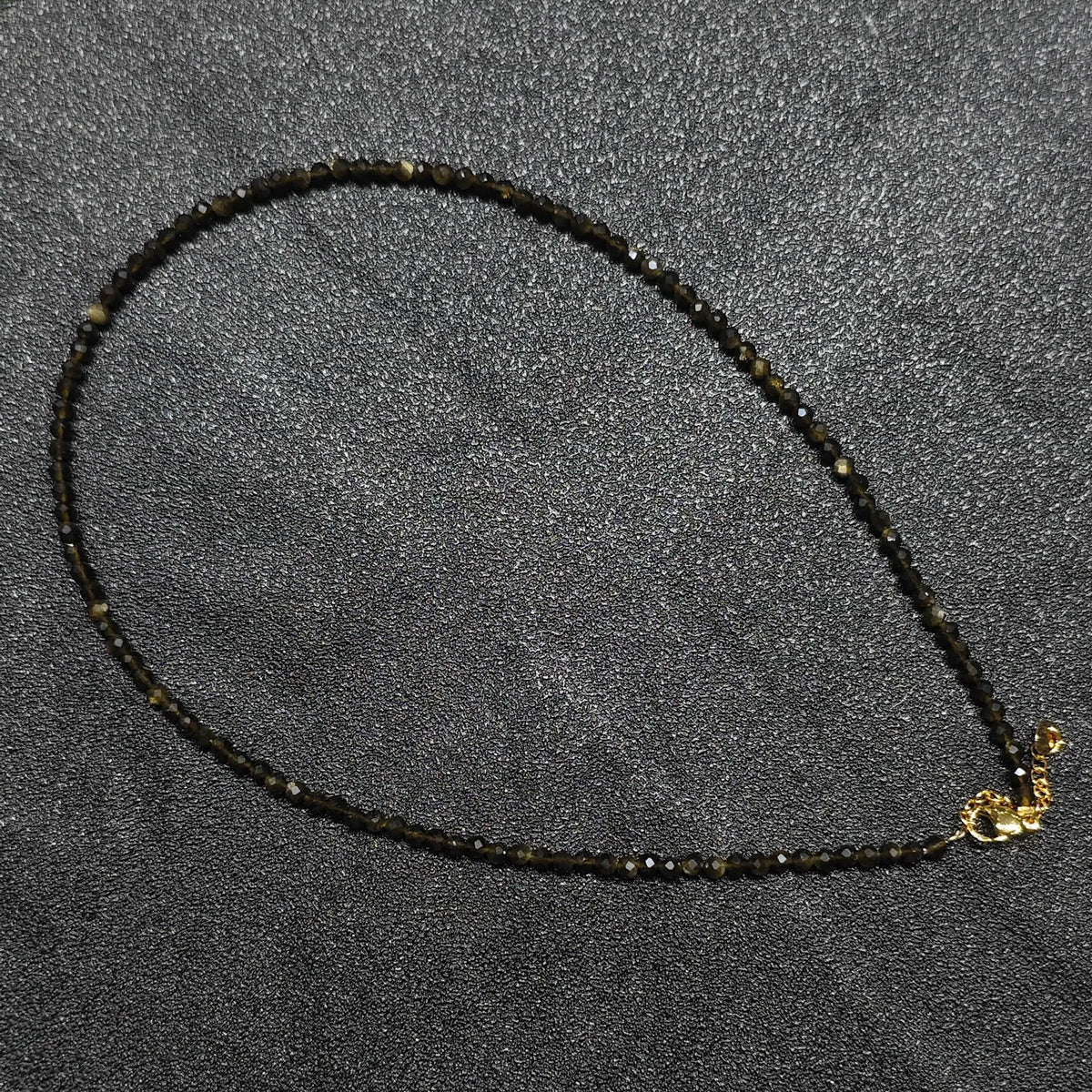 Gold Sheen Obsidian gemstone collar necklace featuring 3mm micro faceted beads and gold extension chain