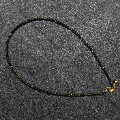 Gold Sheen Obsidian gemstone collar necklace featuring 3mm micro faceted beads and gold extension chain