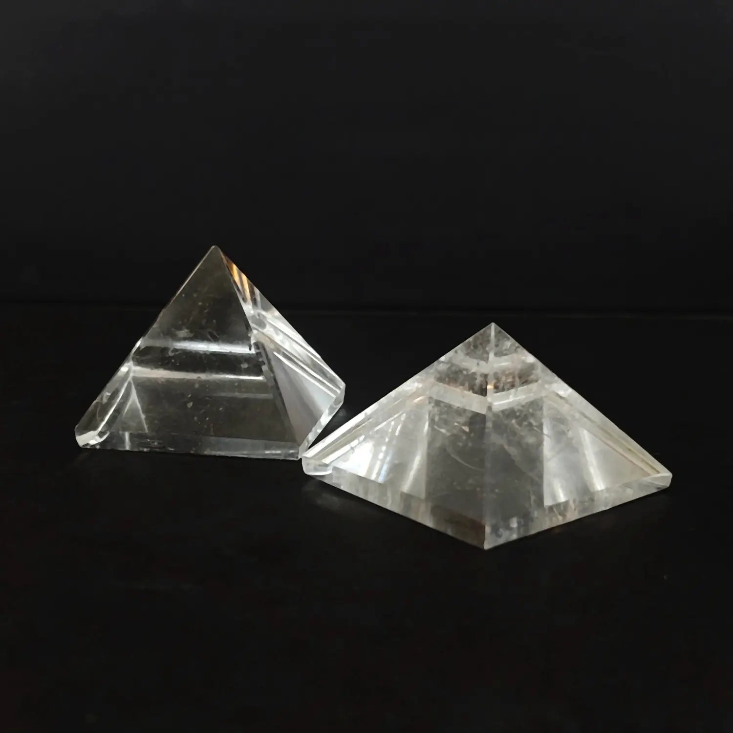 Two natural clear quartz pyramids showing internal ice cracks and cotton inclusions as shown in image_283580.jpg