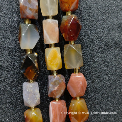 close up of ocean agate cylinder beads showing natural banding and translucent layers