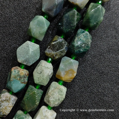 close up of orbicular green ocean jasper faceted cylinder stone