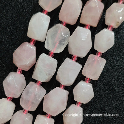 close up view of translucent pastel pink quartz geometric cylinder beads