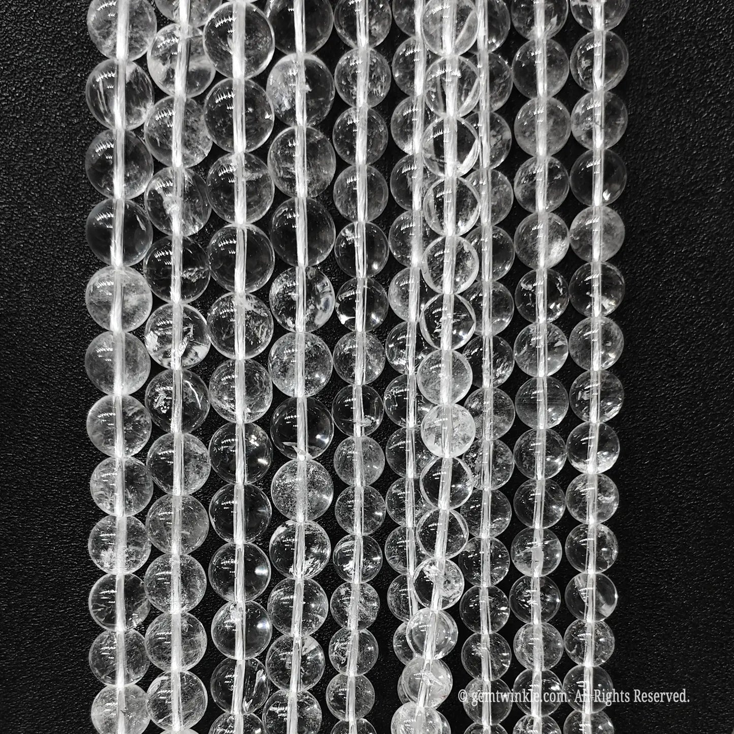 Commercial economy grade clear crystal beads wholesale displaying authentic internal veils and cracks