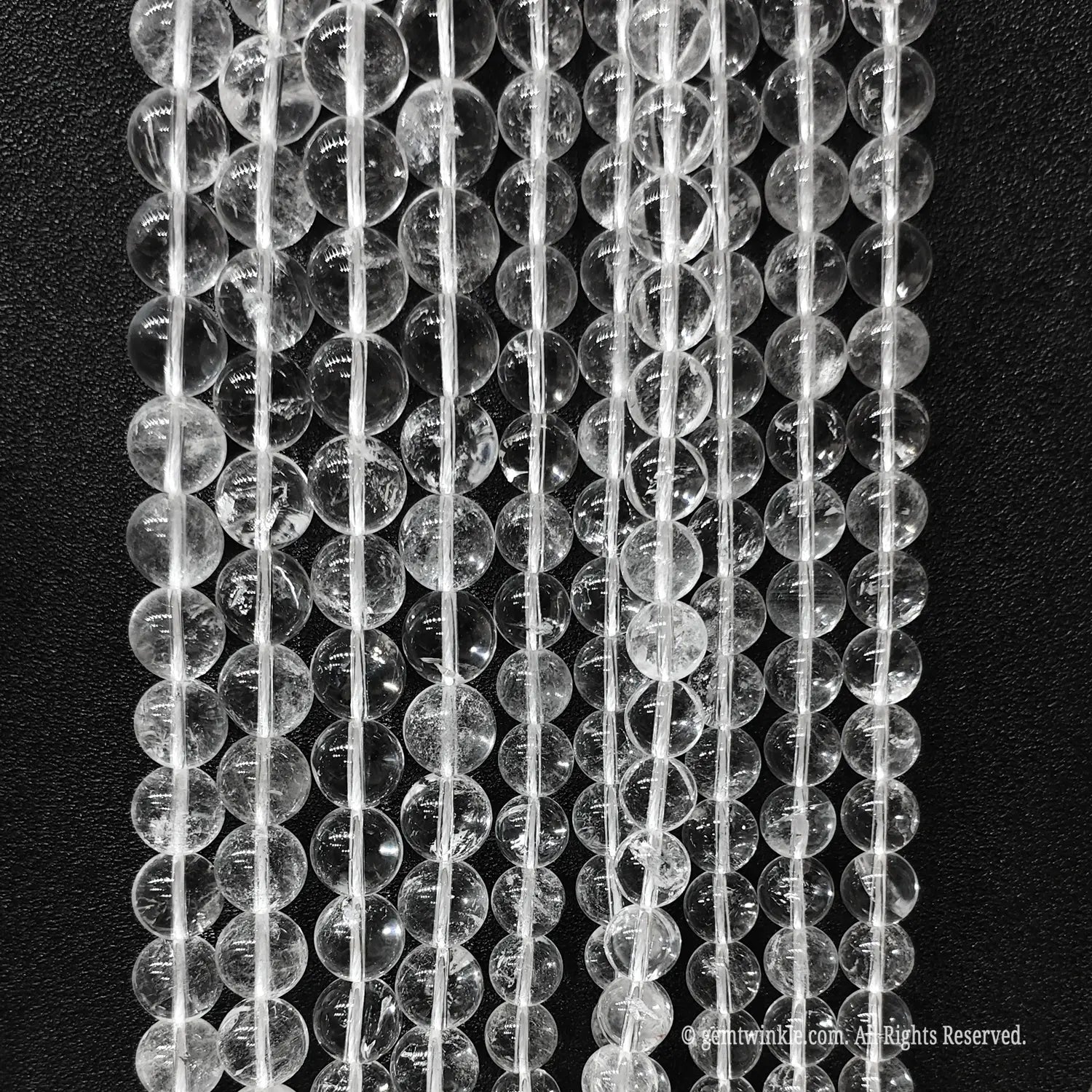 Commercial economy grade clear crystal beads wholesale displaying authentic internal veils and cracks