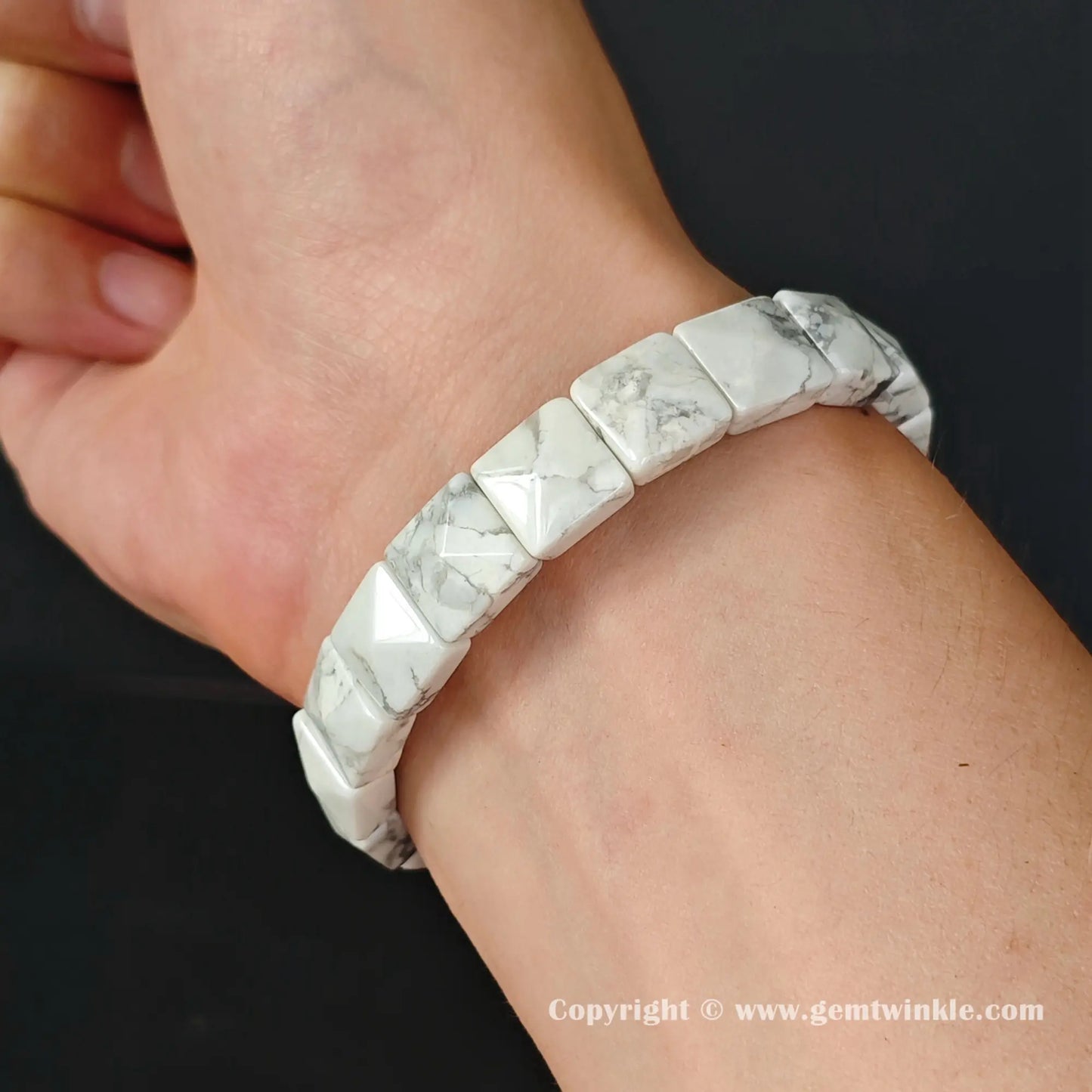 Dainty white howlite geometric plate bracelet worn on a 16cm women wrist
