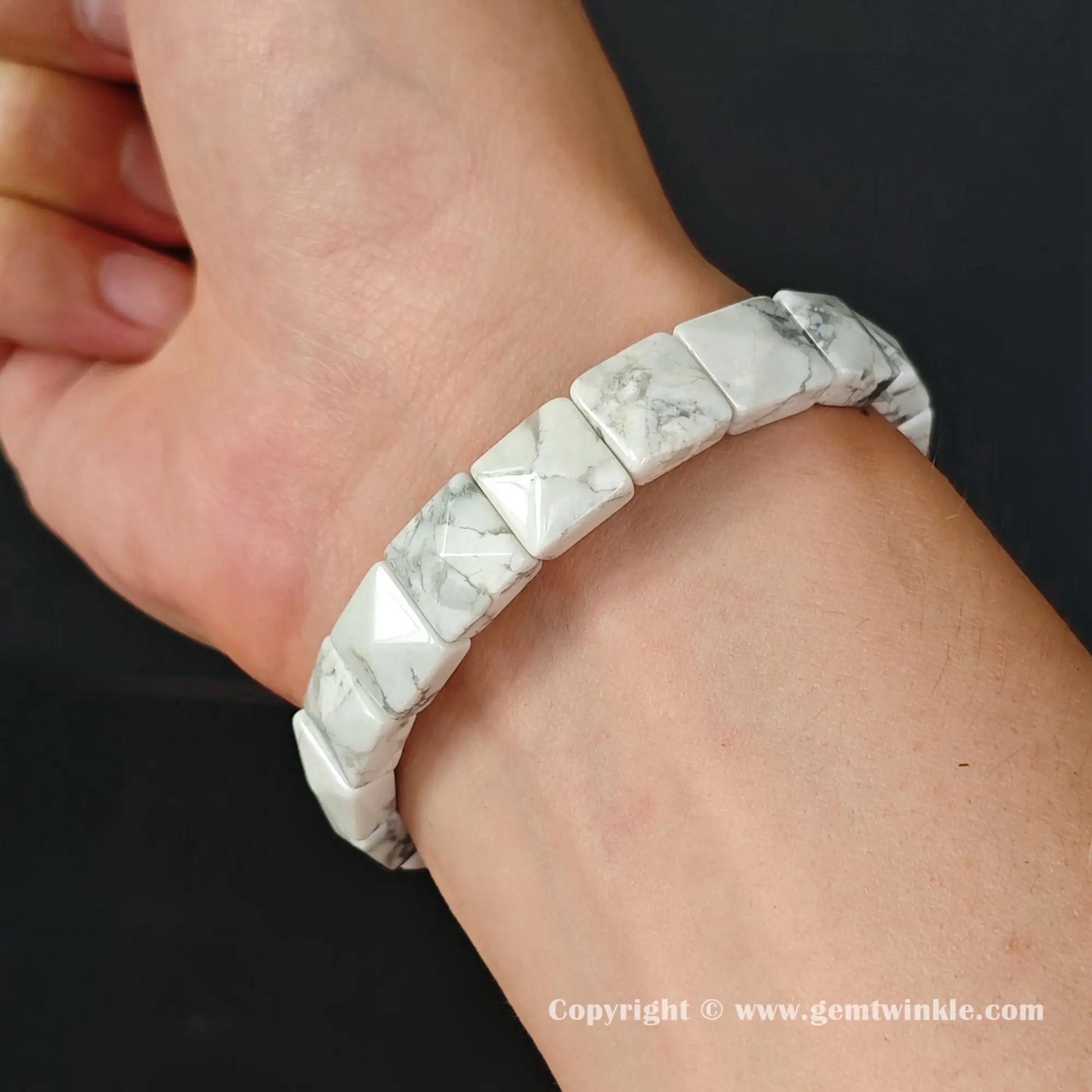 Dainty white howlite geometric plate bracelet worn on a 16cm women wrist