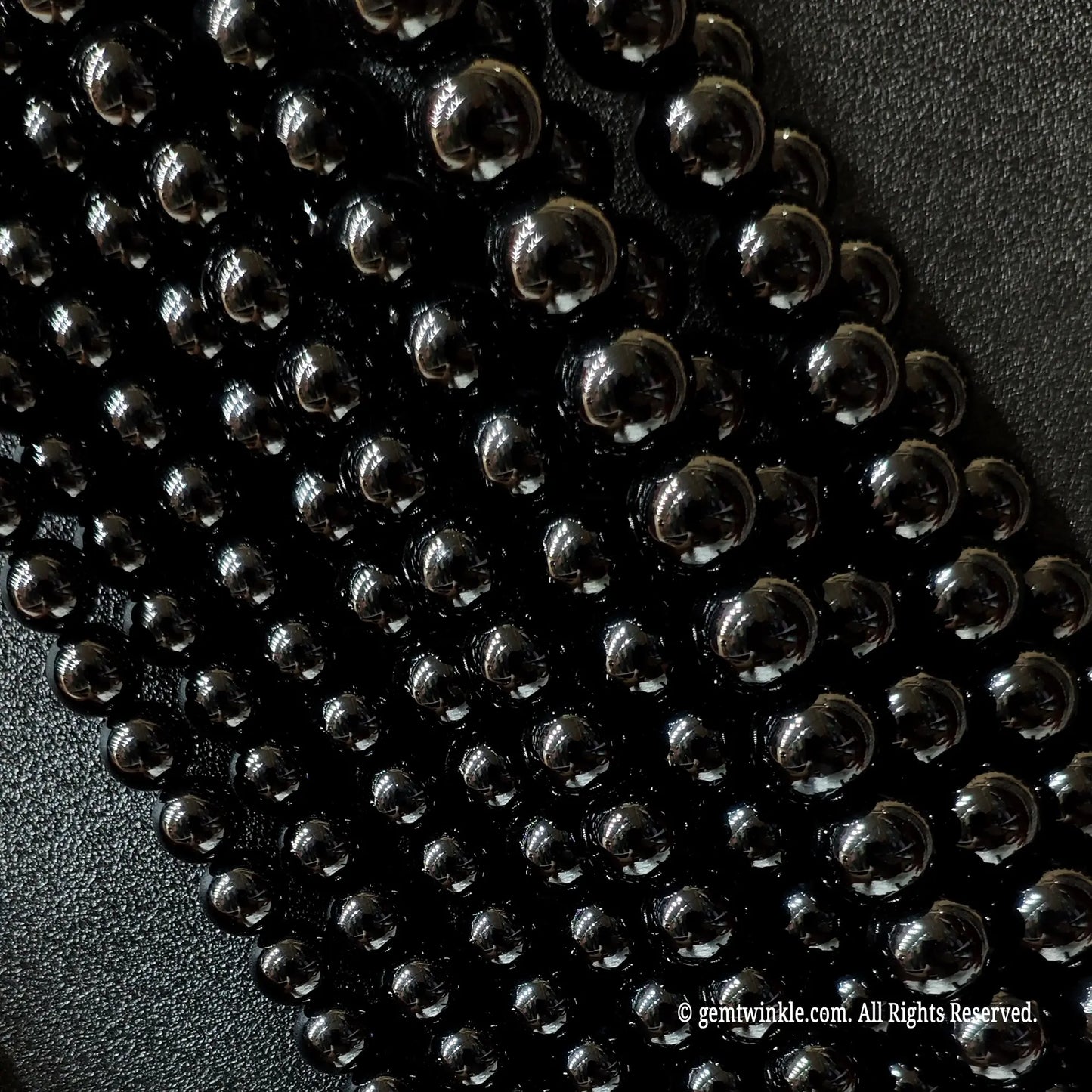 Multiple strands of black agate beads for artisan jewelry projects