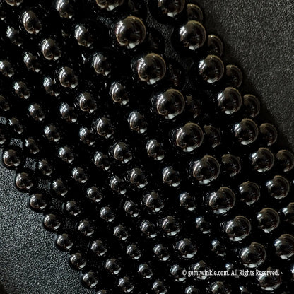 Multiple strands of black agate beads for artisan jewelry projects
