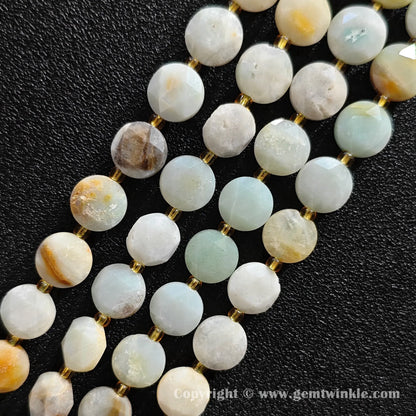 Close up view of earth tone amazonite star faceted flat wheel beads