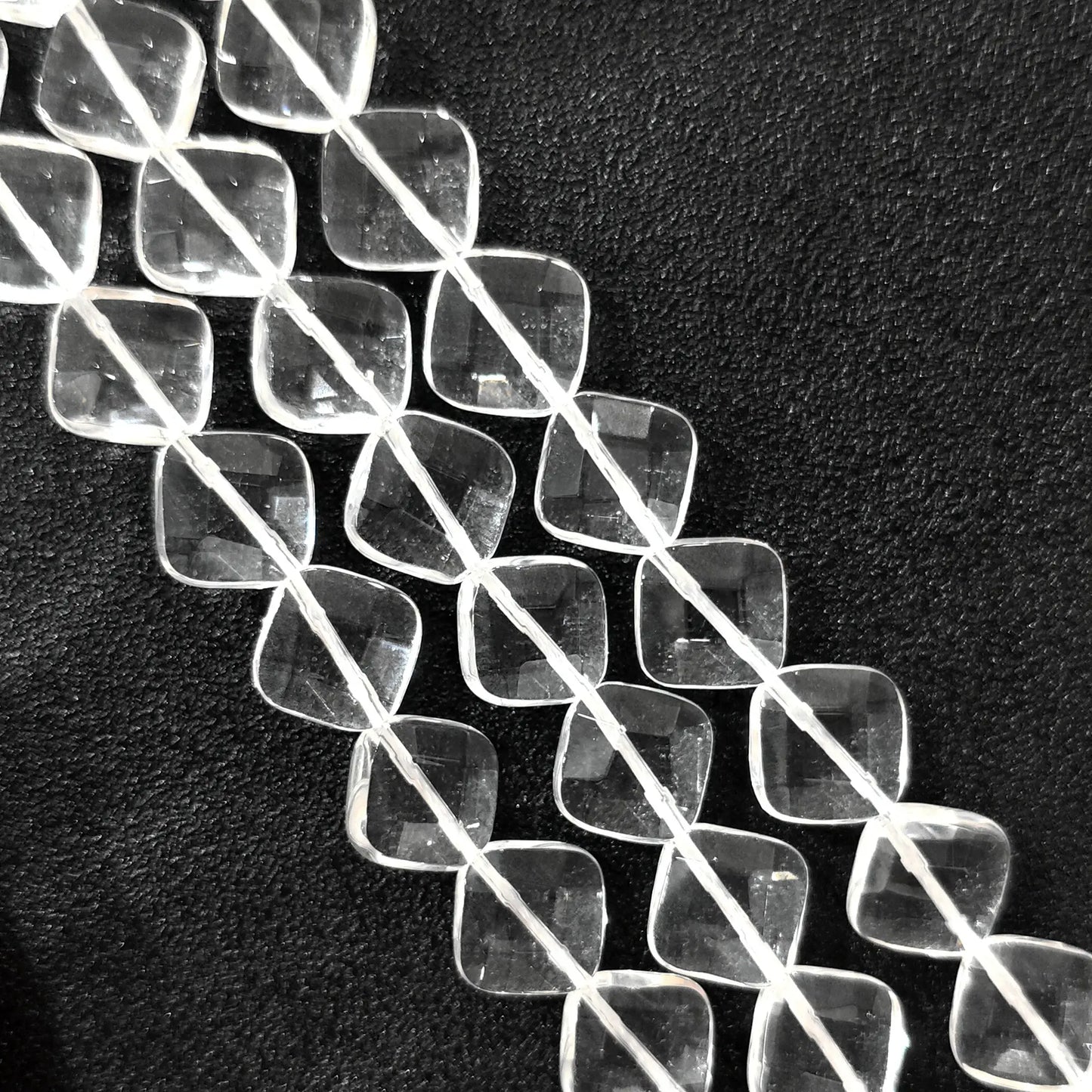 Strand of B-grade natural clear quartz faceted diamond flat rhombus beads 14mm