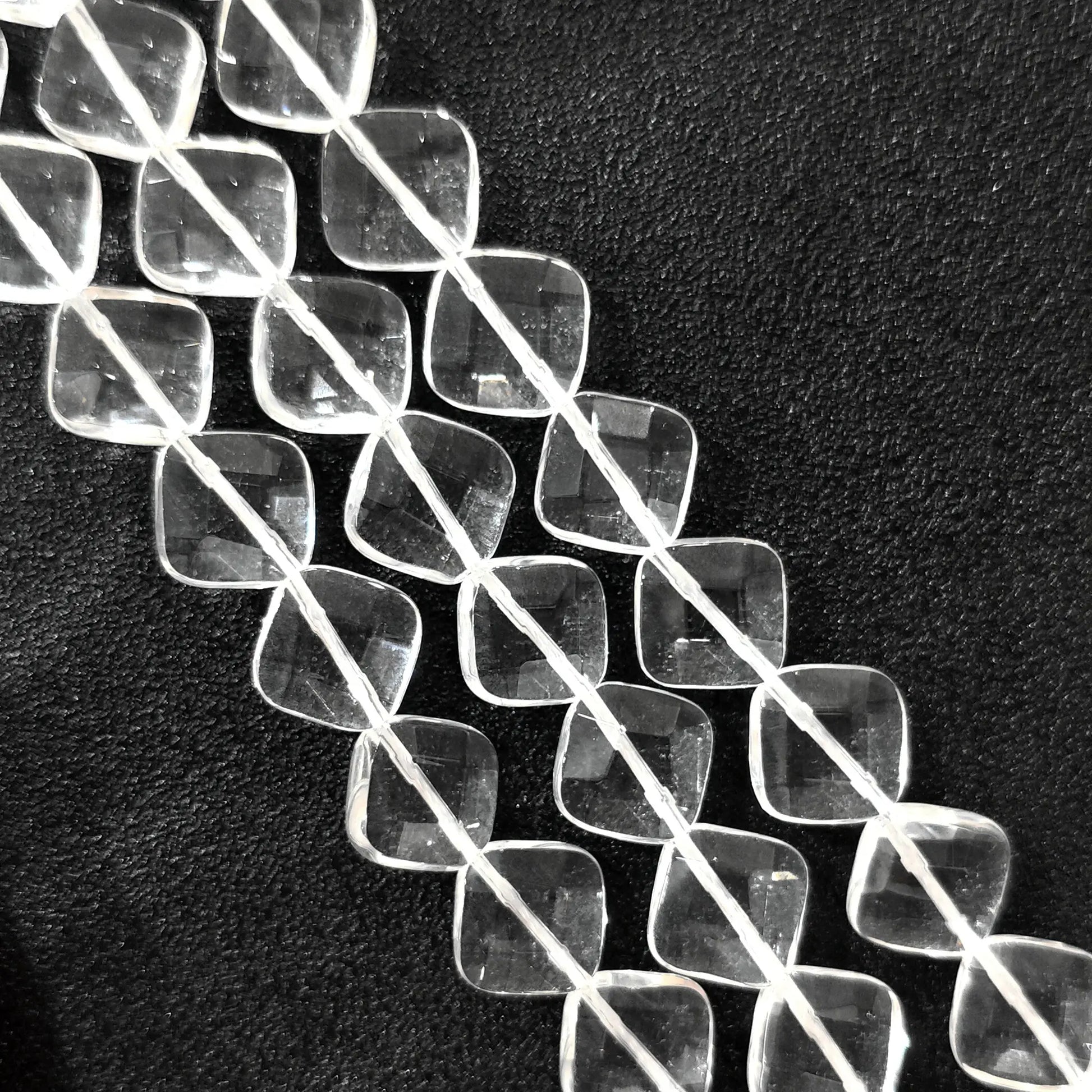 Strand of B-grade natural clear quartz faceted diamond flat rhombus beads 14mm