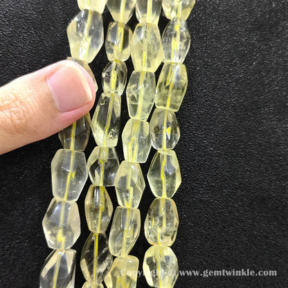 Vertical layout of faceted lemon quartz freeform nugget beads showing yellow brilliance