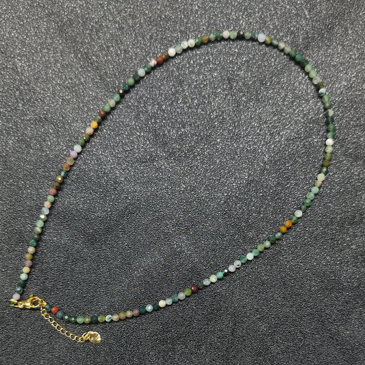Faceted ocean jasper gemstone necklace strand with 3mm beads and gold extension chain layout