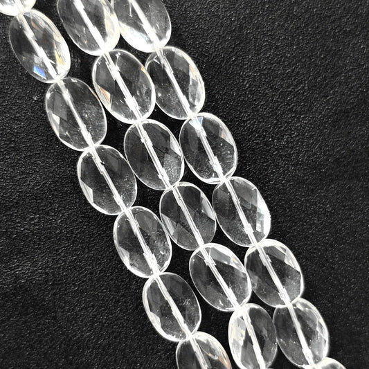 Strand of B-grade natural clear quartz faceted oval flat slice beads 13mm