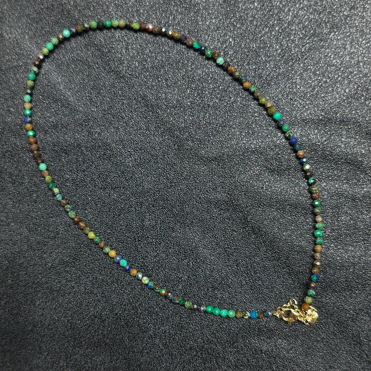 Natural faceted azurite malachite necklace with 3mm beads and gold extension chain layout