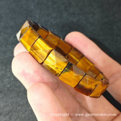side profile view of machine polished yellow tigers eye square pyramid bead bracelet