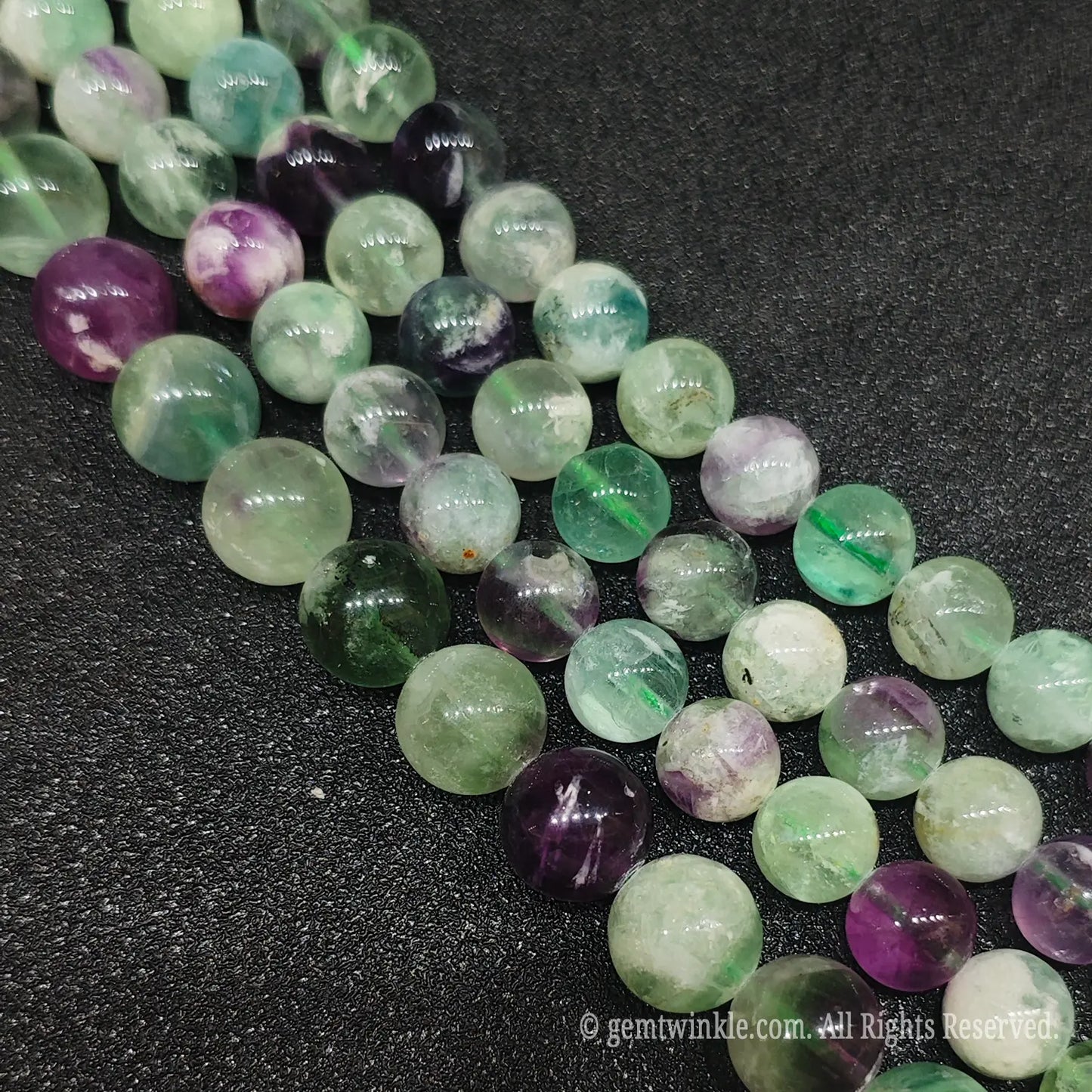 Size range from 6mm to 12mm of natural feather fluorite gemstone round beads for boutique jewelry creators and Etsy sellers