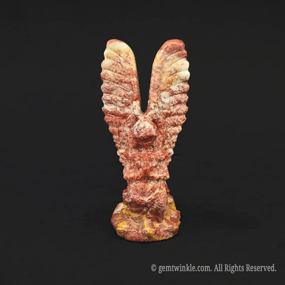 Natural flame stone angel wings carving featuring earthy mottled red and brown organic rock patterns