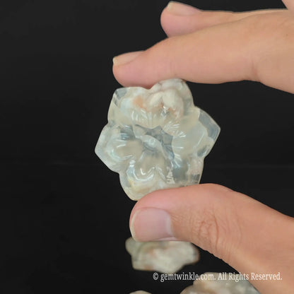 Back view of carved cherry blossom sakura agate plate highlighting smooth flat polished base