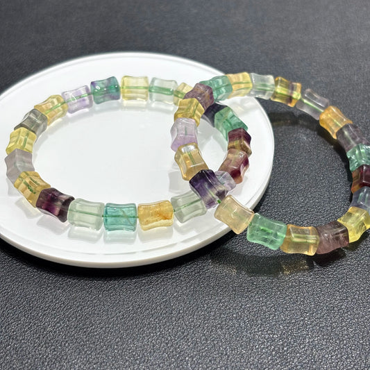 Multicolor fluorite square bead bracelets photographed in natural light to show the true vibrant colors of the gemstones.