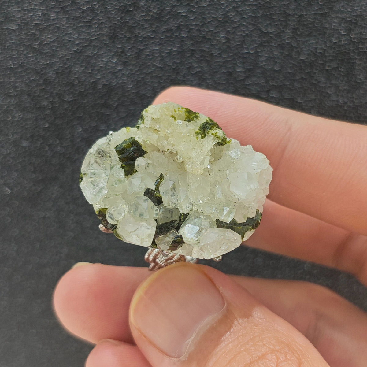 Freeform raw epidote cluster ring bottom view showing natural stone slice matrix and secure metal mounting